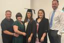 Amy Marren (centre), pictured with family members, has won an MBE for services to further education and apprenticeships