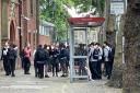 School children waiting for the 603 bus which has been described by campaigners as a 'ghost' route