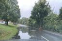 A road in Great Cornard is flooded after overnight rain