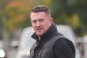 Political activist Tommy Robinson outside Folkestone Police Station, he has said he has been told to hand himself in to a police station where he expects to be arrested ahead of a planned march for thousands of people in London. Supporters of Robinson,