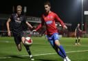 Callum Reynolds of Dagenham and Redbridge and Andy Smith of Salford City