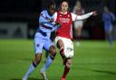 Arsenal's Danielle Van de Donk (right) and West Ham United's Hawa Cissoko battle for the ball during the FA Women's Super League match at Meadow Park, Borehamwood. Picture date: Wednesday April 28, 2021.