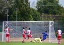 Sporting Bengal United's Zakariya Haque wheels off to celebrate after scoring against Ilford (pic: Tim Edwards)