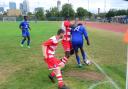 A Sporting Bengal United player looks to keep the ball in the corner against Ilford (pic: Tim Edwards).