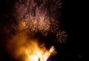 Fireworks illuminate the night sky over London on New Year's Eve