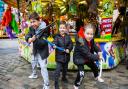 Tyler Kaynak, nine, Leo Kaynak, three, and Freddie Finch, nine, at the Christmas funfair.