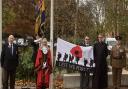 From left to right: Peter Hyam, Michael Gott, Cllr Olivia Sanders, Richard Hyam, Father Mark North  Captain Nick Allston (124 Transport Squadron).