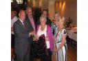 Margaret Smith (centre) retired in 2011. She is pictured with Melvin Wallace, Havering mayor at the time and colleague Thom Stanbury