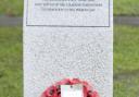 Members of the Ilford 84 branch of the Parachute Regimental Association with their memorial in Coronation Gardens, Romford