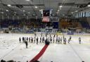 Raiders and Leeds players shake hands after their play-off final battle in Coventry