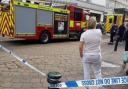 A cordon remains in place outside a Primark store in Romford's South Street