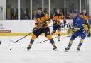 Raiders defenceman Tom Relf attacks against Leeds