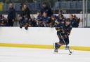 Everyone Active Raiders coach Sean Easton looks on as Riley MacRae attacks