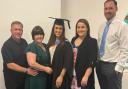 Amy Marren (centre), pictured with family members, has won an MBE for services to further education and apprenticeships