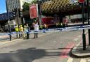 A large police cordon has been set up around Sutton Walk by London Waterloo