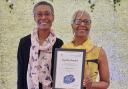 Juliette Samuel (right) with her long service award