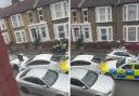 Screengrabs from a video posted by CrimeLDN after a car crashed reportedly crashed in Leyton Park Road