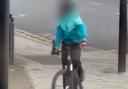 A man has been arrested after a video emerged appearing to show a cyclist wielding a large knife