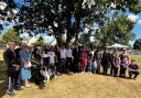 Politicians and Harold Hill residents celebrating after Gooshays Green was given village green status