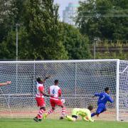 Sporting Bengal United's Zakariya Haque wheels off to celebrate after scoring against Ilford (pic: Tim Edwards)