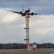 A plane lands at Stansted during Storm Eunice