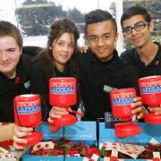 Mark Straker, 16, Sevim Wigzell, 17, Mark-Anthony Bautista, 17, and Vijay Persaud, 18, fundraising for the Elm Park Royal British Legion at the Tesco store in Airfield Way, Hornchurch