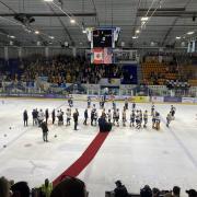 Raiders and Leeds players shake hands after their play-off final battle in Coventry