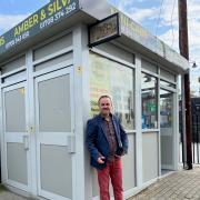 Amber Cars Harold Wood owner Arjan Plaku outside his stand