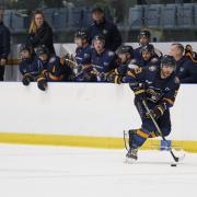 Everyone Active Raiders coach Sean Easton looks on as Riley MacRae attacks