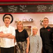 From left to right: A Gordon Ramsay lookalike joins Lindsay Miller, Cheryl Jones, Billy Hughes and Jade Jacobs at Tea Pot Cafe during the Romford Food festival.