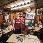 L-R: Jarrod Bowen and Mohammed Kudus modelling West Ham's 2024/25 home shirt