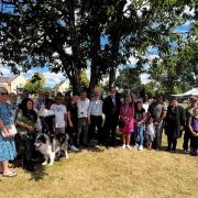 Politicians and Harold Hill residents celebrating after Gooshays Green was given village green status