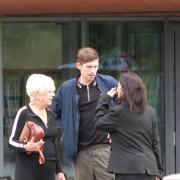 Court – Joshua Joyce leaves court with his grandmother and defence solicitor, Philippa Beswick