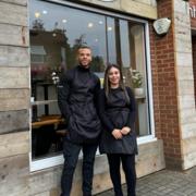 Jeyda Johnson and husband James outside their restaurant Cafe 25a