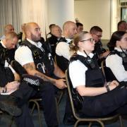 Officers are briefed ahead of the action day