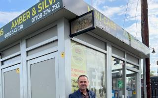 Amber Cars Harold Wood owner Arjan Plaku outside his stand