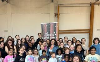 Jesy Nelson (centre) visited Rhodes Theatre School, where she was once a student