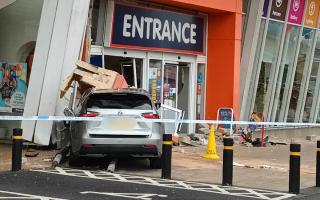 A car ploughed into the front entrance of the Range