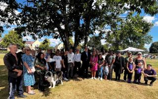 Politicians and Harold Hill residents celebrating after Gooshays Green was given village green status