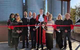 Mayor of Havering, Cllr Gerry O'Sullivan and London Riverside BID chairman, Eric Mollison, with architects Untitled Practice, contractors Borras Construction and guests at the opening of the new Rainham Riverside community garden and seating area