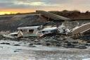 Awful - the couple's boat after it washed ashore in Mersea