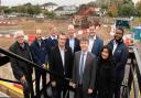 Havering Council leader Cllr Damian White with councillors, Wates Residential representatives, members of the regeneration team and a former Serena Court resident.