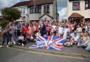 Residents from Dawes Avenue with Mayor Trevor McKeever holding a King gnome