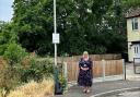 Cllr Jane Keane near Bridge Close - where she wants tougher enforcement of illegal activity