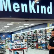 Store manager Jaffa Khan at Mercury Shopping Centre's re-opened MenKind