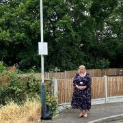 Cllr Jane Keane near Bridge Close - where she wants tougher enforcement of illegal activity