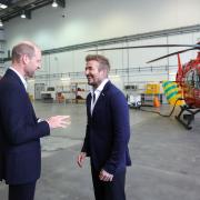 Prince William and David Beckham during a visit to RAF Northolt to view two new London Air Ambulance Charity helicopters