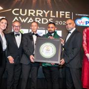 The Temple Indian Fusion team receiving Curry Life Awards from host Camilla Tominey, Former London minister Paul Scully and Charlotte Nichols MP.